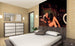 Dimex Girl in Garage Wall Mural 225x250cm 3 Panels Ambiance | Yourdecoration.com